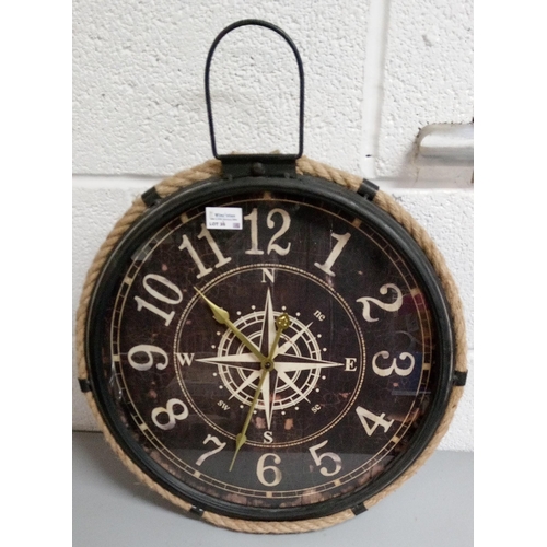 35 - A Compass Clock.