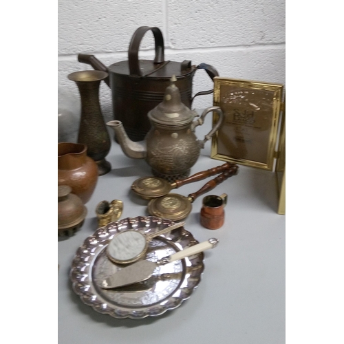 841 - A Selection of Brass and Copperware.