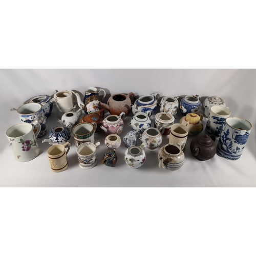 136 - A LARGE COLLECTION OF 18TH / 19TH CENTURY TEAPOTS AND TANKARDS, including Chinese export wares, a Me... 