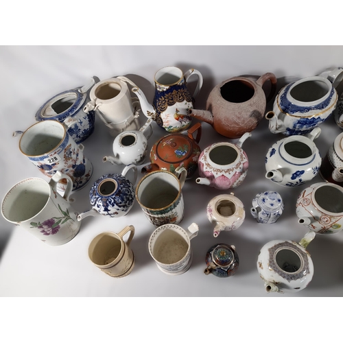 136 - A LARGE COLLECTION OF 18TH / 19TH CENTURY TEAPOTS AND TANKARDS, including Chinese export wares, a Me... 