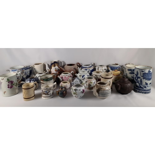 136 - A LARGE COLLECTION OF 18TH / 19TH CENTURY TEAPOTS AND TANKARDS, including Chinese export wares, a Me... 