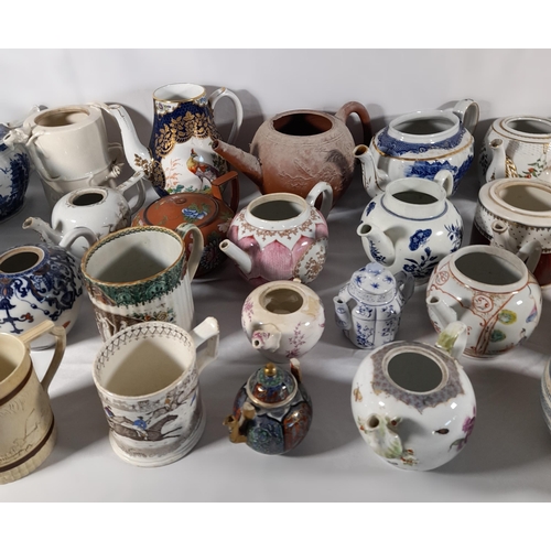 136 - A LARGE COLLECTION OF 18TH / 19TH CENTURY TEAPOTS AND TANKARDS, including Chinese export wares, a Me... 