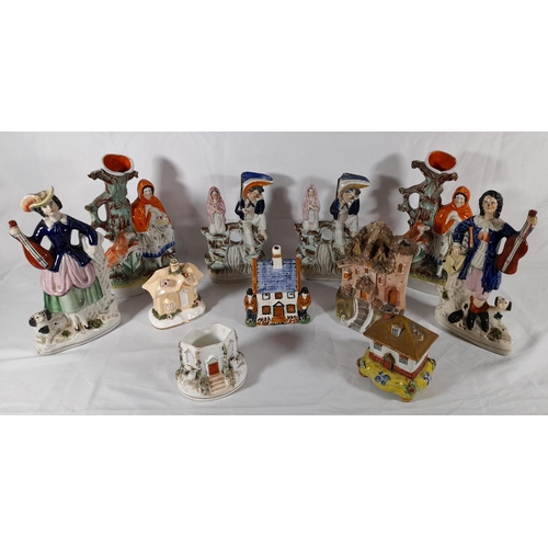 127 - A GROUP OF 19TH CENTURY STAFFORDSHIRE WARES, the lot includes a pair of flat back musician figures, ... 