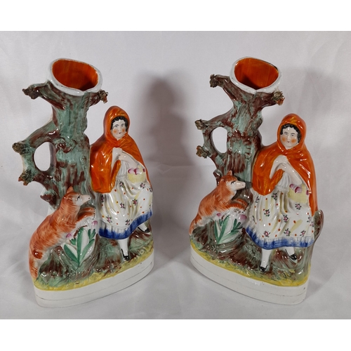 127 - A GROUP OF 19TH CENTURY STAFFORDSHIRE WARES, the lot includes a pair of flat back musician figures, ... 