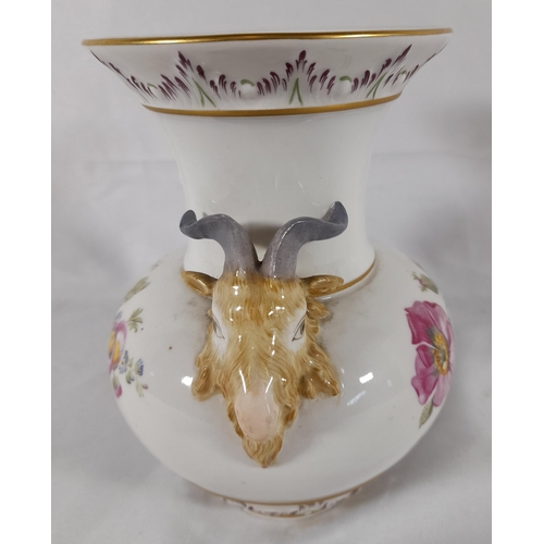 132 - A GERMAN KPM VASE, tapered compressed form with flared mouth, the neck flanked by twin goat head mas... 