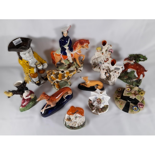 139 - AN EARLY 19TH CENTURY PRATT WARE FIGURAL SPILL VASE AND A GROUP OF STAFFORDSHIRE WARES, including a ... 