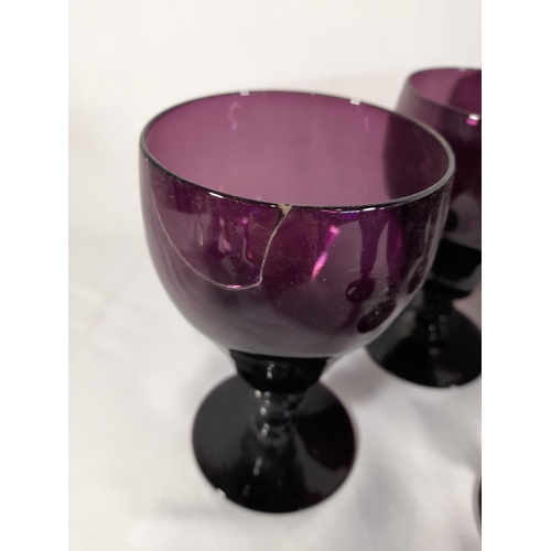 141 - A SET OF EIGHT 19TH CENTURY AMETHYST GLASS KNOPPED STEM GOBLETS, along with a mixed group of 19th ce... 