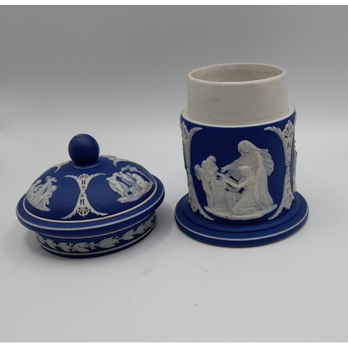 152 - A QUANTITY OF WEDGEWOOD CAMEO DECORATED JASPER WARES, including three biscuit barrels, a pair of can... 