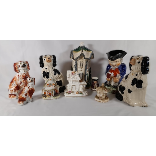 153 - A GROUP OF 19TH CENTURY STAFFORDSHIRE WARES, including a large cottage form pastel burner, toby jug,... 