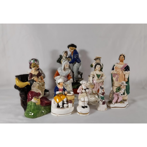 155 - A 19TH CENTURY STAFFORDSHIRE 'SAILOR'S RETURN' FIGURE, along with ten other Staffordshire figures of... 