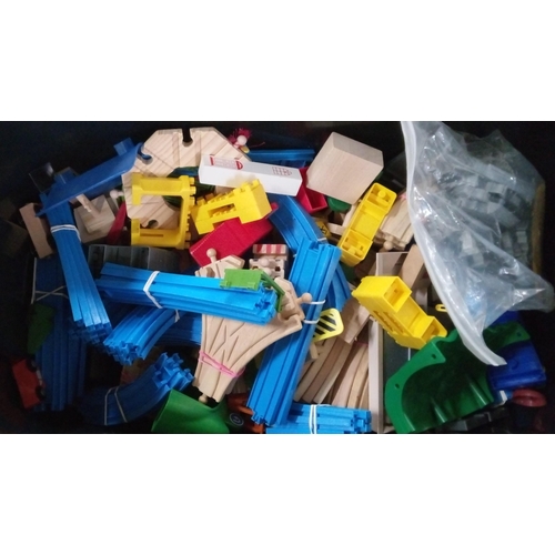 1233 - A Large Crate of Wooden and Plastic Train Sets in Wheel Crate.