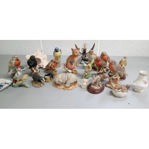 42 - A Quantity of China Animals and Shell Light.