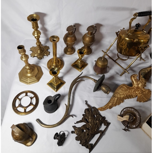 161 - A MIXED GROUP OF BRASS AND COPPER WARES, the lot includes a brass spirit kettle on stand, various 19... 