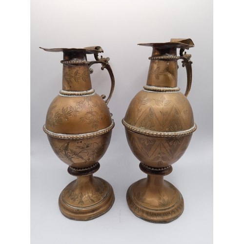 161 - A MIXED GROUP OF BRASS AND COPPER WARES, the lot includes a brass spirit kettle on stand, various 19... 