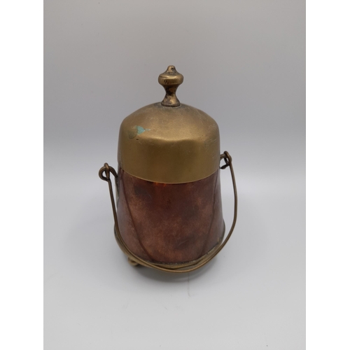 161 - A MIXED GROUP OF BRASS AND COPPER WARES, the lot includes a brass spirit kettle on stand, various 19... 