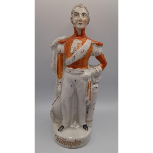 182 - A GROUP OF MID 19TH CENTURY STAFFORDSHIRE WARES, the lot includes a figure of Wellington, a large fi... 