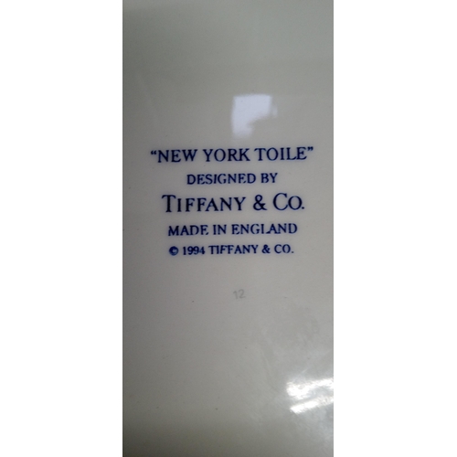 650 - A New York Toilet Plate designed by Tiffany and Co dated 1994. 32cm D.