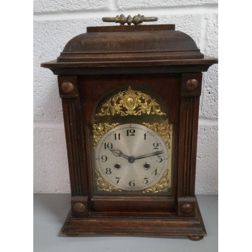 658 - A Mantle Clock with Brass Detailing to Clock Face.