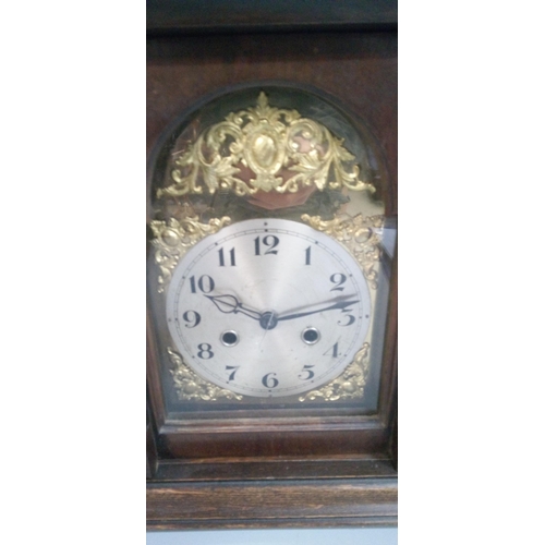 658 - A Mantle Clock with Brass Detailing to Clock Face.