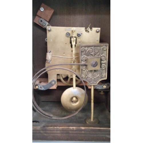 658 - A Mantle Clock with Brass Detailing to Clock Face.