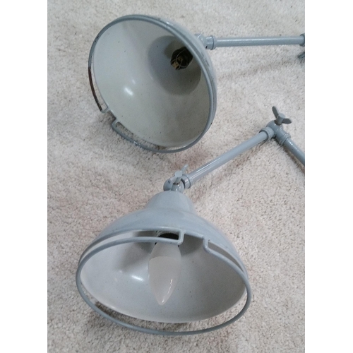 660 - A Pair of Vintage Industrial Style Adjustable Lamps.