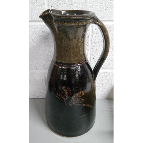 667 - A Large Decorative Jug with C's Stamped on Base. Standing 45cm H.