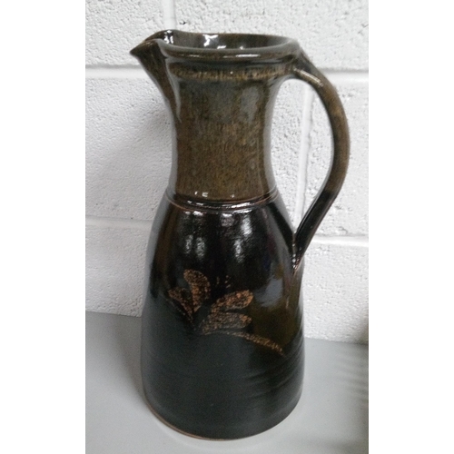 667 - A Large Decorative Jug with C's Stamped on Base. Standing 45cm H.