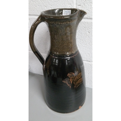 667 - A Large Decorative Jug with C's Stamped on Base. Standing 45cm H.