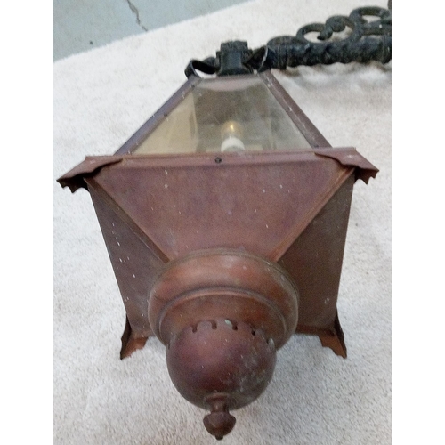 654 - A Copper and Wrought Iron Vintage Style Wall Hanging Outside Lamp. 90cm H x 48cm w.