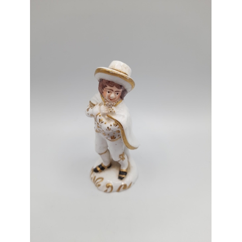 183 - A MIXED GROUP OF PORCELAIN FIGURES, mainly 19th Century, including biscuit porcelain figures, cream ... 