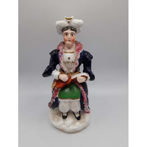 185 - A MIXED GROUP OF 19TH CENTURY FIGURINES, the lot includes a Walton figure of Matthew, two pearlware ... 