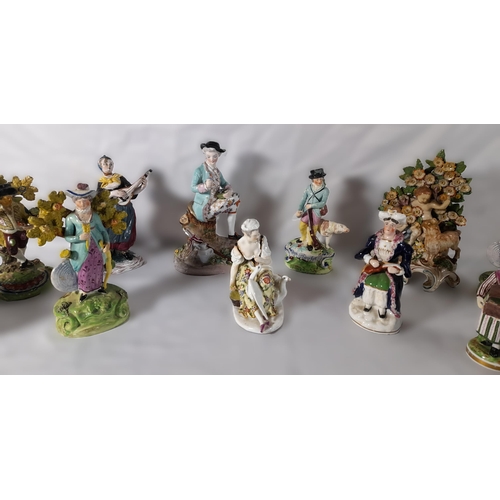 185 - A MIXED GROUP OF 19TH CENTURY FIGURINES, the lot includes a Walton figure of Matthew, two pearlware ... 