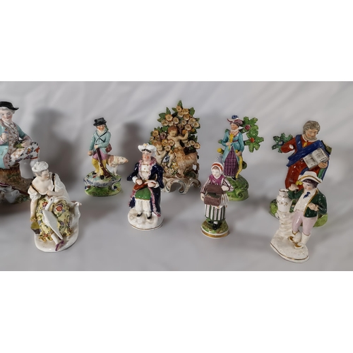 185 - A MIXED GROUP OF 19TH CENTURY FIGURINES, the lot includes a Walton figure of Matthew, two pearlware ... 