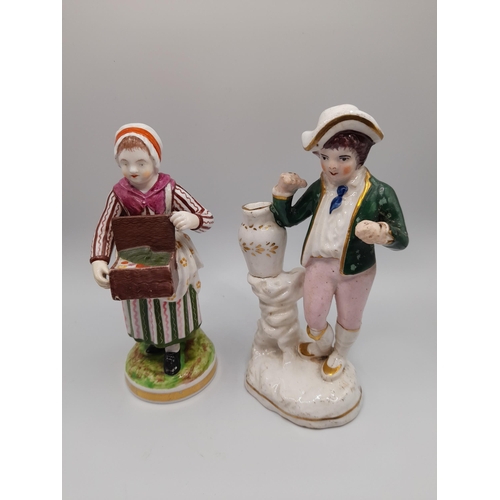 185 - A MIXED GROUP OF 19TH CENTURY FIGURINES, the lot includes a Walton figure of Matthew, two pearlware ... 