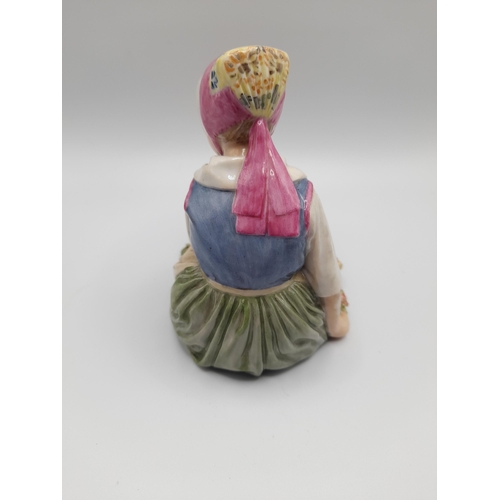 187 - A ROYAL COPENHAGEN FIGURE, 'Flower Girl from Sjalland' from a series by Carl Martin-Hansen, with und... 