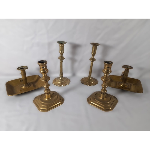 189 - SEVEN PAIRS OF 19TH CENTURY BRASS CANDLESTICKS, including a pair on domed circular feet and a pair o... 