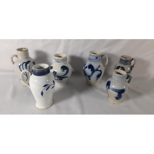 195 - A GROUP OF  SIX STAFFORDSHIRE SCRATCH BLUE SALT GLAZED TAVERN JUGS, LATE 18TH CENTURY
baluster form ... 