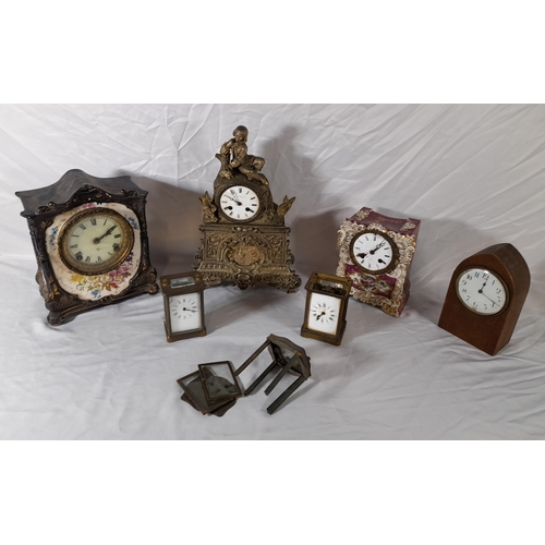 202 - A MIXED GROUP OF 19TH CLOCKS, the lot includes two French porcelain bracket clocks decorated with fl... 