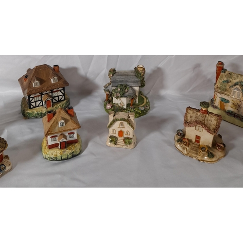 206 - A GROUP OF ELEVEN 19TH CENTURY PASTEL BURNERS, modelled as cottages and houses, various sizes
14.5 c... 