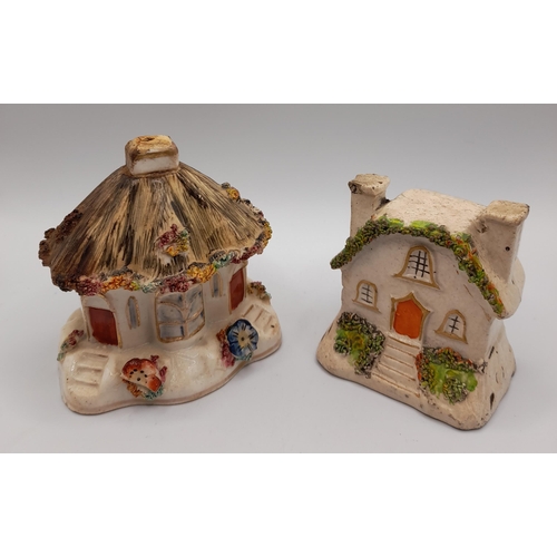 206 - A GROUP OF ELEVEN 19TH CENTURY PASTEL BURNERS, modelled as cottages and houses, various sizes
14.5 c... 