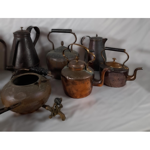 200 - A GROUP OF 19TH CENTURY MIXED BRASS AND COPPER WARES, the lot consisting of kettles, hot water jugs,... 