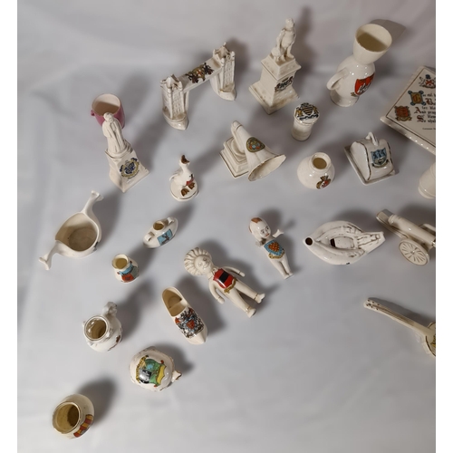 212 - A COLLECTION OF CRESTED CHINA MODELS, early 20th Century, various figures and trinkets, mostly Goss ... 