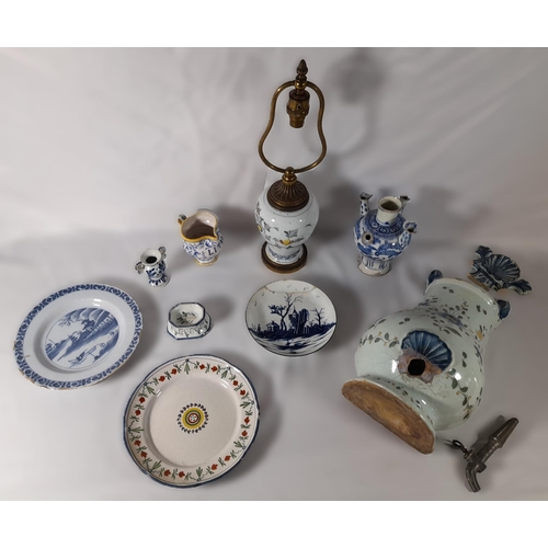 213 - A GROUP OF 18TH/19TH CENTURY FAIENCE POTTERY WARES, including Dutch Delft plates, a polychrome balus... 