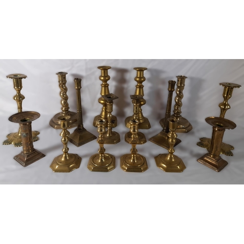 215 - EIGHT PAIRS OF 19TH CENTURY BRASS CANDLESTICKS, various styles and sizes, including knopped pillar a... 