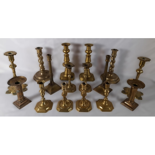 215 - EIGHT PAIRS OF 19TH CENTURY BRASS CANDLESTICKS, various styles and sizes, including knopped pillar a... 