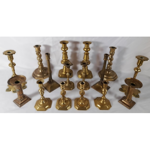 215 - EIGHT PAIRS OF 19TH CENTURY BRASS CANDLESTICKS, various styles and sizes, including knopped pillar a... 