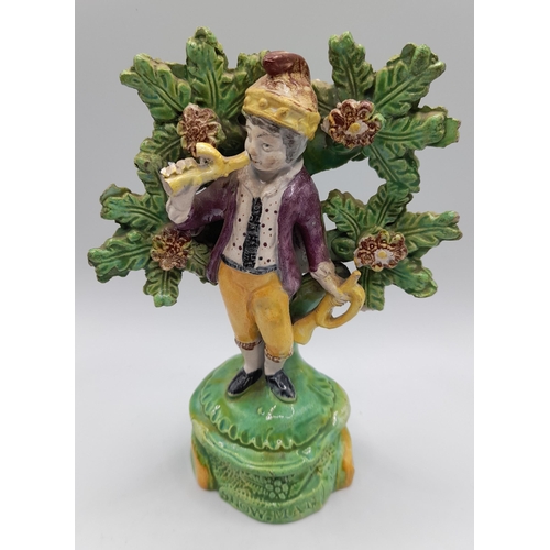 219 - A GROUP OF EARLY 19TH CENTURY PEARL WARE MODELS, the lot includes a Prattware figure decorated watch... 