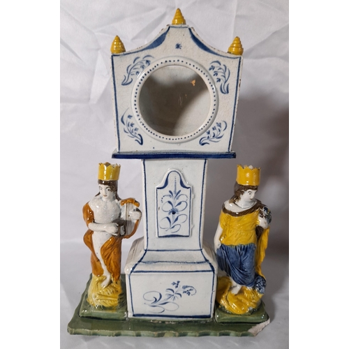 219 - A GROUP OF EARLY 19TH CENTURY PEARL WARE MODELS, the lot includes a Prattware figure decorated watch... 