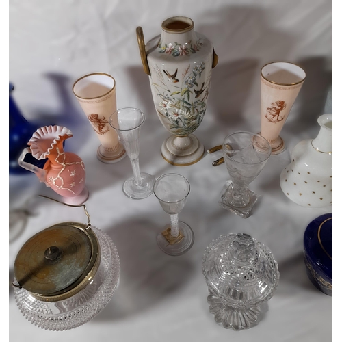 221 - A GROUP OF MIXED VINTAGE GLASS WARES, the lot includes three 18th century air twist stemmed glasses,... 