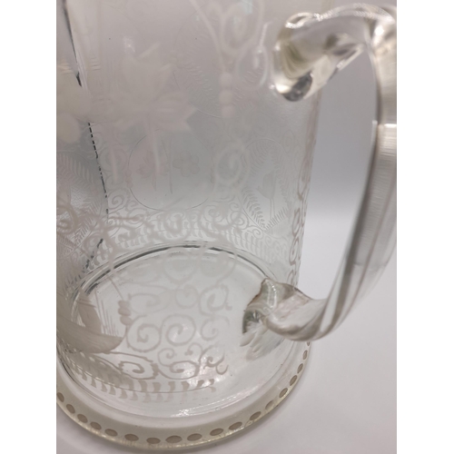 222 - AN EXCEPTIONAL 19TH CENTURY OVERSIZED GLASS TANKARD, the sides acid etched with circular reserve pan... 